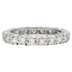 Mid-Century 0.66 CTW Diamond Platinum Vintage Fishtail Eternity Band Ring