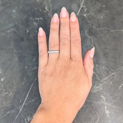 Mid-Century 0.70 CTW Diamond Platinum Vintage Seven Stone Wedding Band Ring