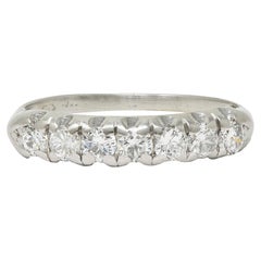 Mid-Century 0.70 CTW Diamond Platinum Vintage Seven Stone Wedding Band Ring