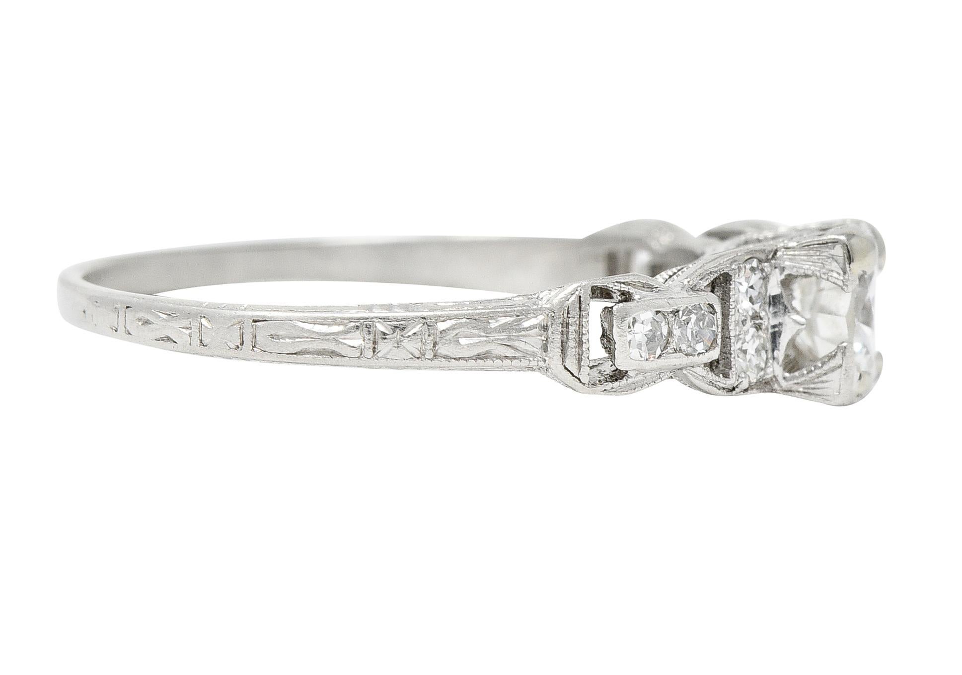 Brilliant Cut Mid-Century 0.75 CTW Diamond Platinum Buckle Square Form Vintage Engagement Ring For Sale