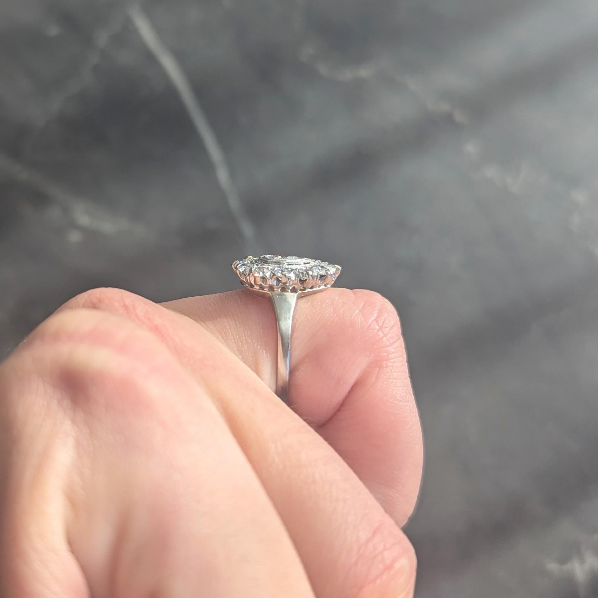 Mid-Century 0.88 CTW Pear Cut Diamond Platinum Vintage Halo Ring In condizioni ottime in vendita a Philadelphia, PA