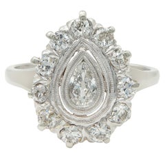 Mid-Century 0.88 CTW Pear Cut Diamond Platinum Vintage Halo Ring