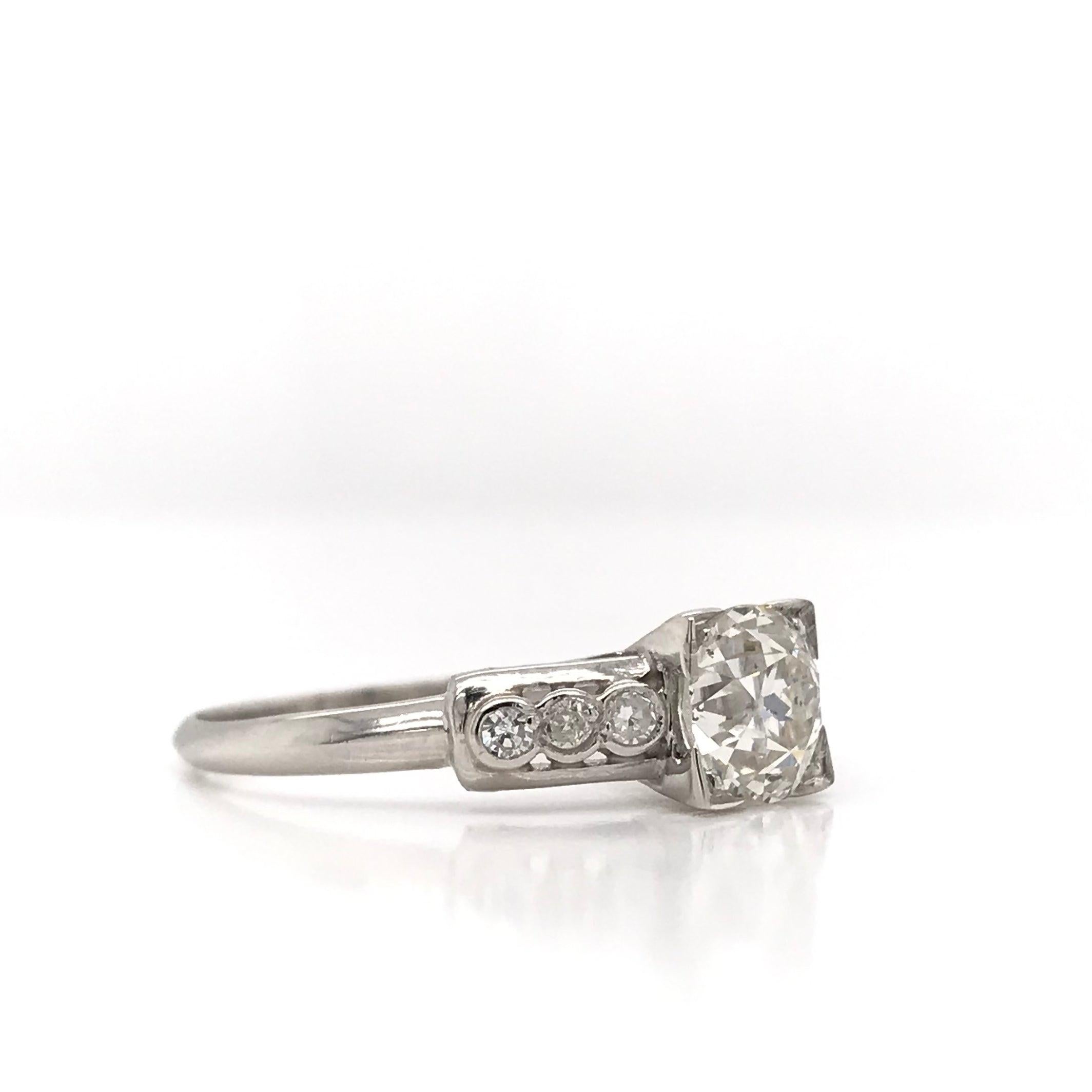 Women's Mid Century 0.90 Carat Diamond Solitaire Style Platinum Ring For Sale