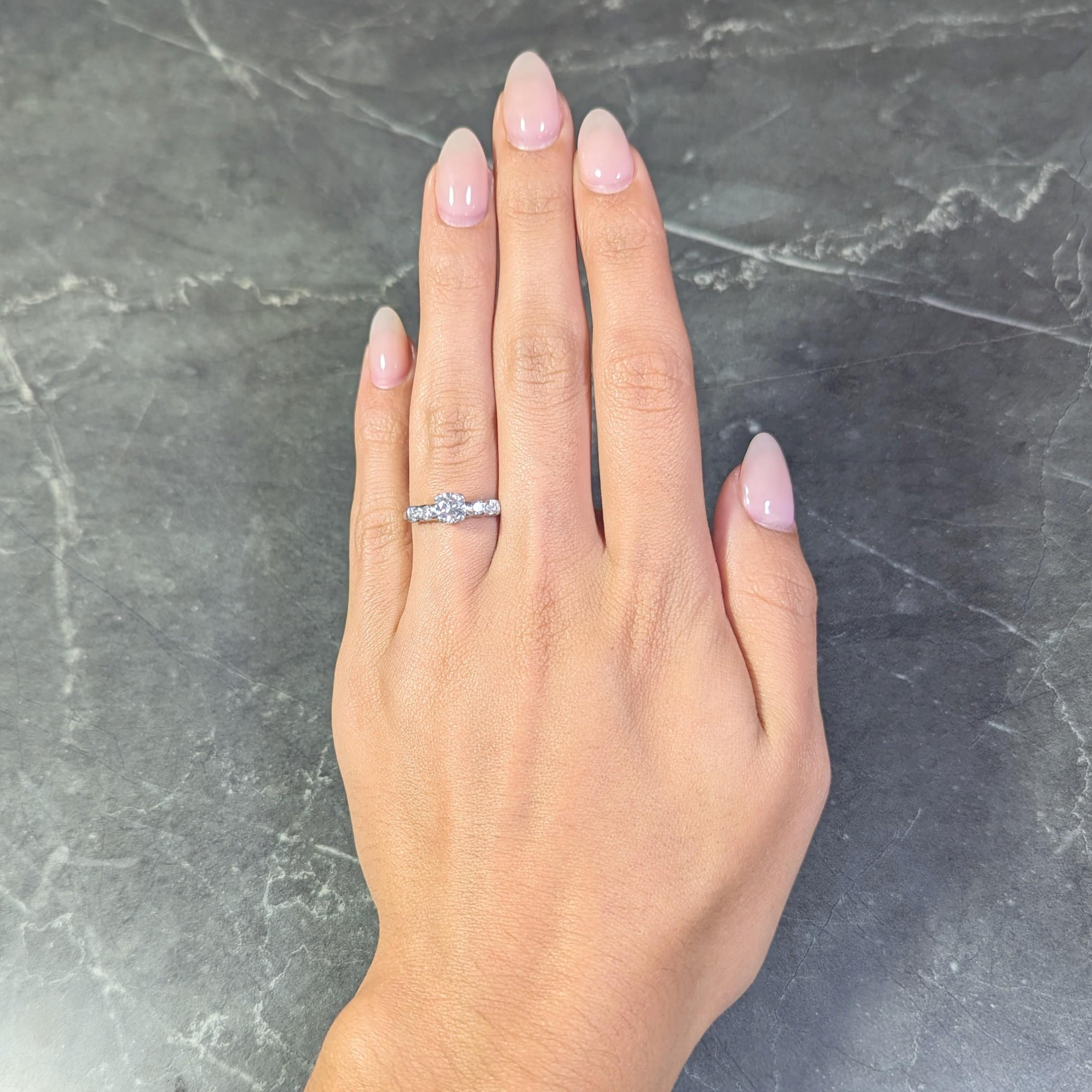 Mid-Century 0.92 CTW Diamond Platinum Five Stone Vintage Engagement Ring For Sale 11