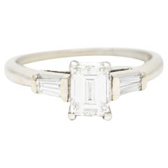 Mid-Century 0.93 Carat Emerald Cut Diamond 14 Karat White Gold Engagement Ring