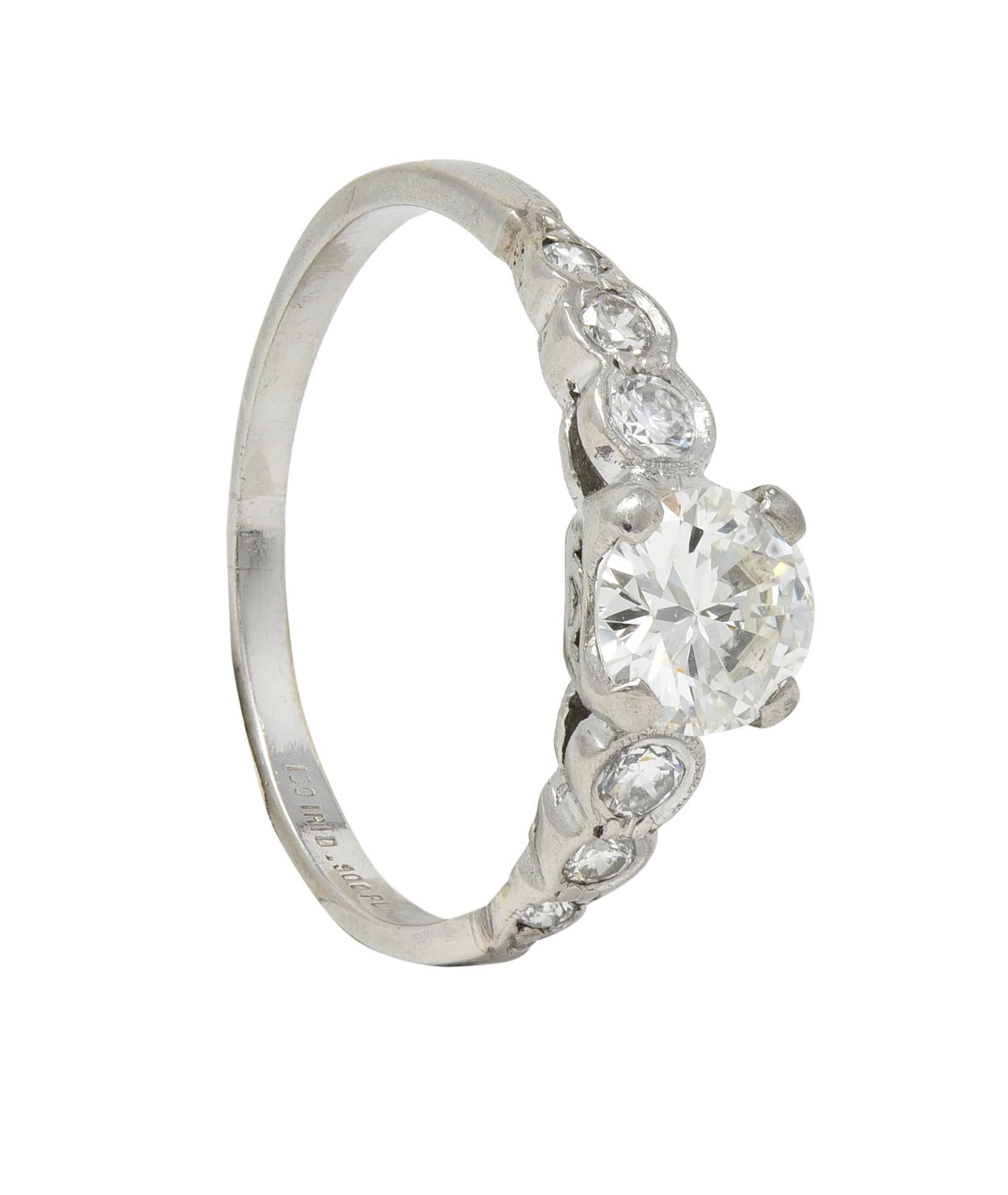 Mid-Century 0.94 CTW Diamond Platinum Seven Stone Vintage Engagement Ring For Sale 5