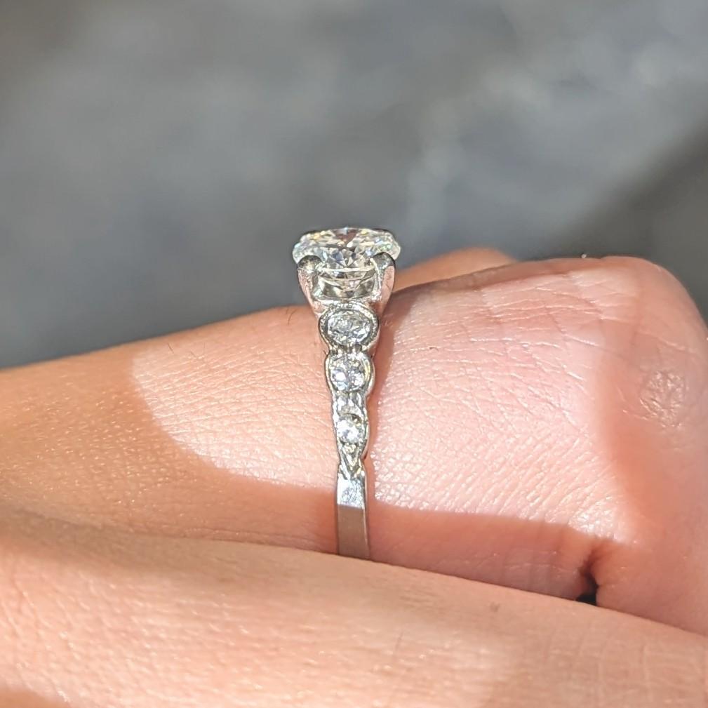 Mid-Century 0.94 CTW Diamond Platinum Seven Stone Vintage Engagement Ring For Sale 8