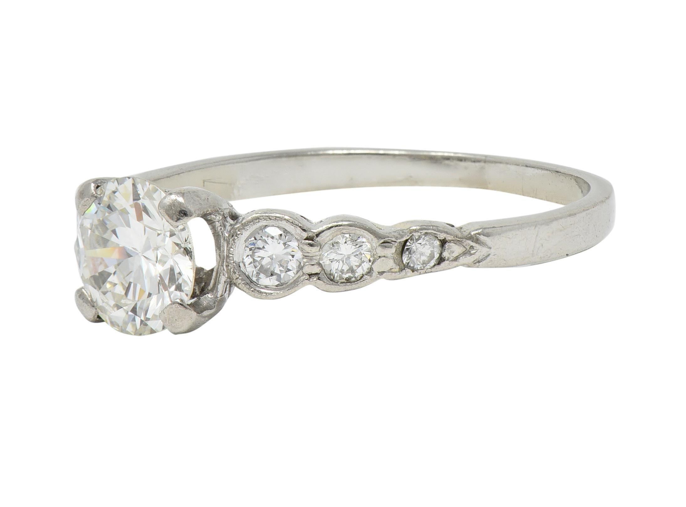 Mid-Century 0.94 CTW Diamond Platinum Seven Stone Vintage Engagement Ring For Sale 1