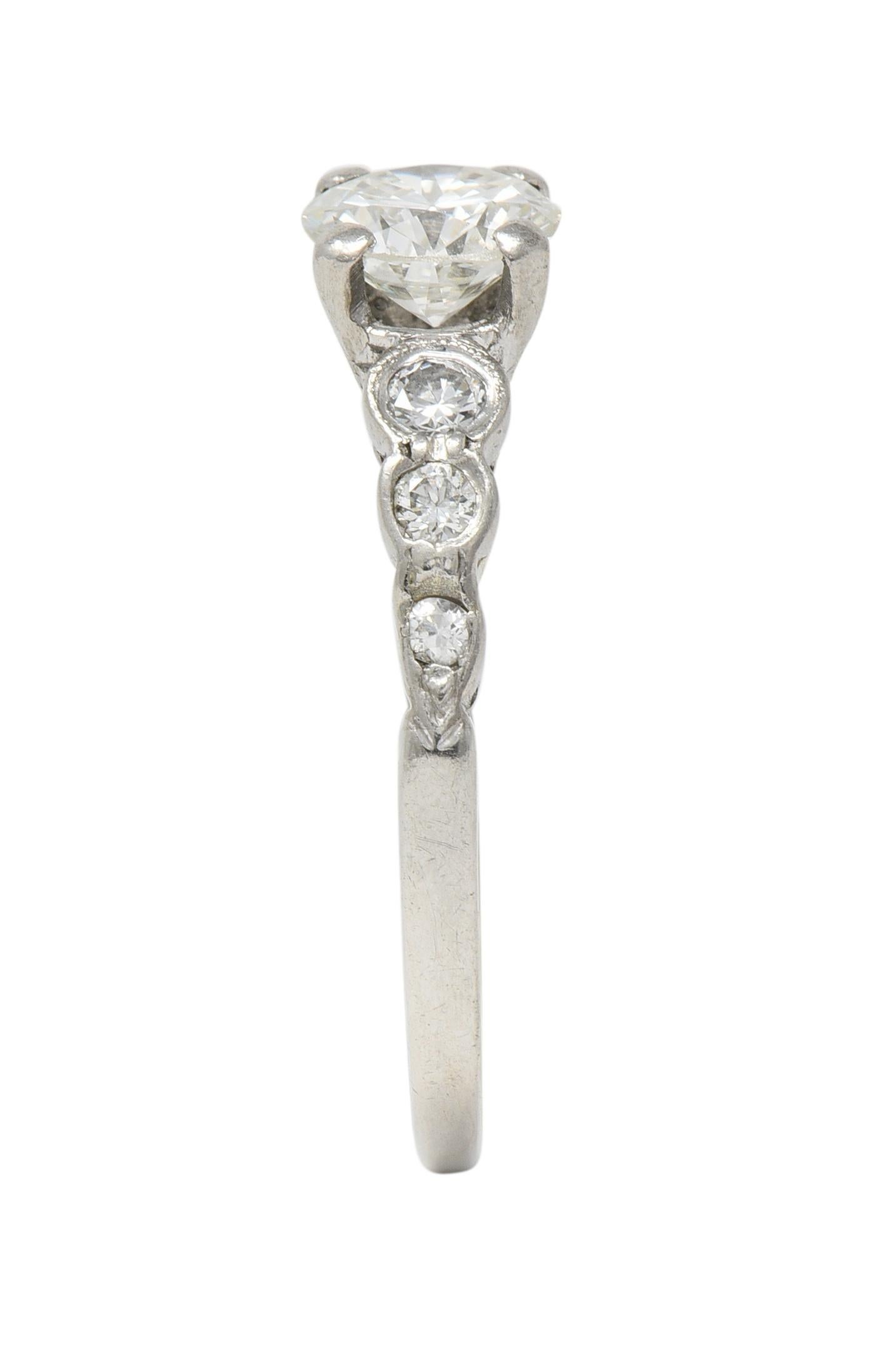 Mid-Century 0.94 CTW Diamond Platinum Seven Stone Vintage Engagement Ring For Sale 3
