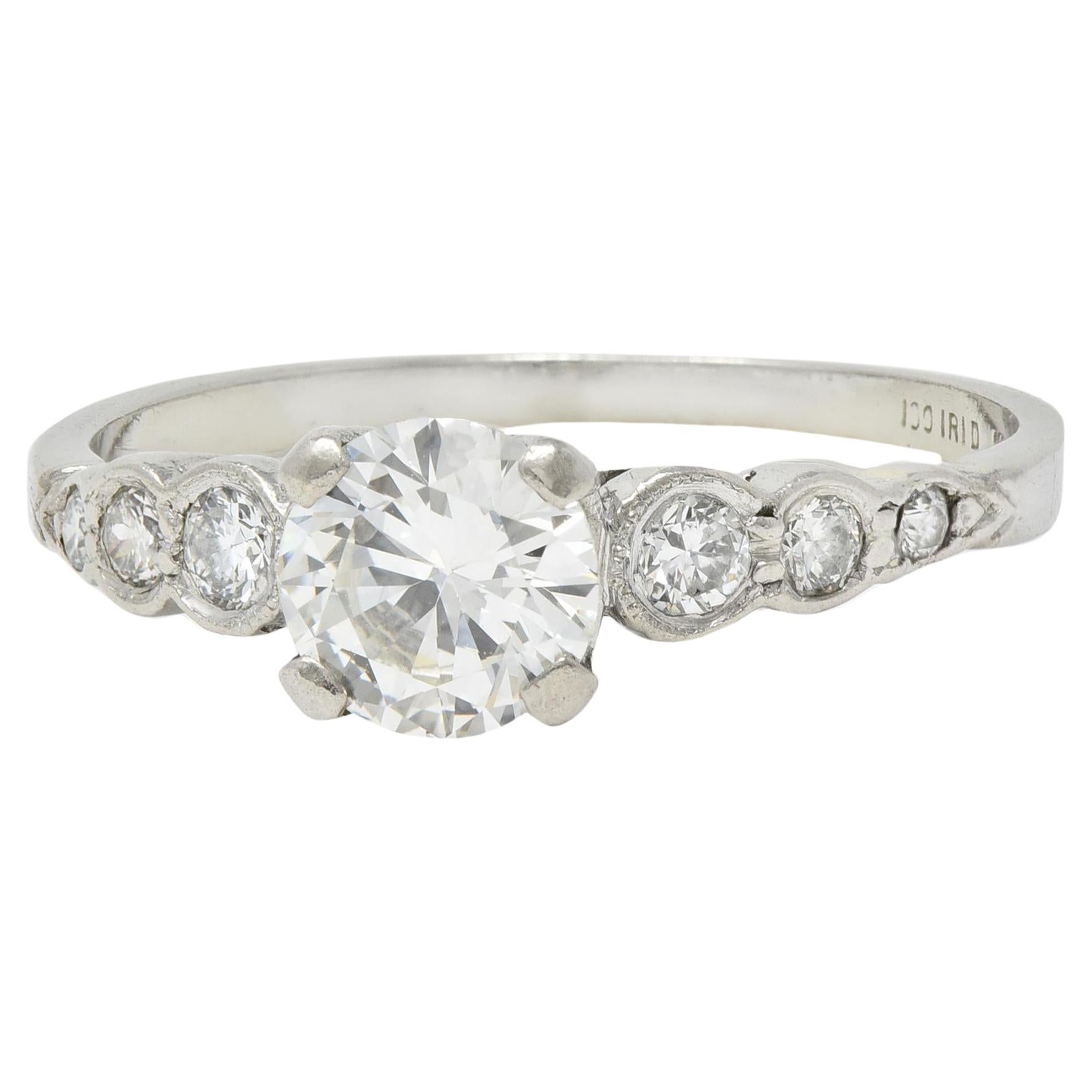 Mid-Century 0.94 CTW Diamond Platinum Seven Stone Vintage Engagement Ring For Sale