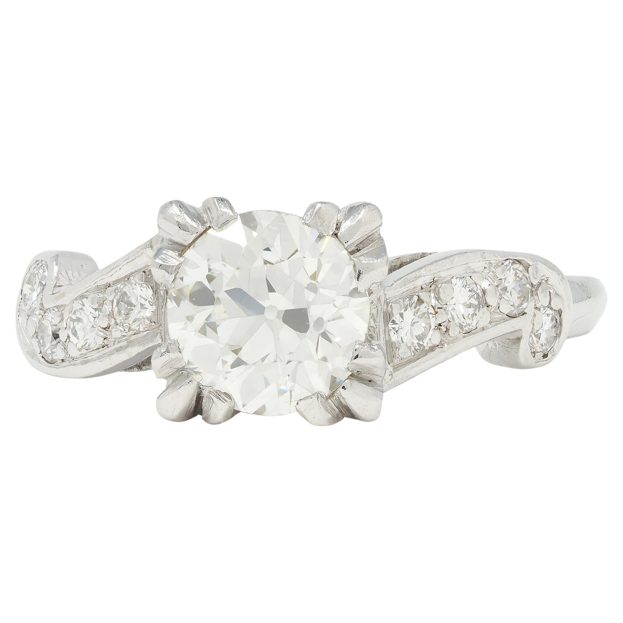 Mid-Century 1.11 CTW Diamond Platinum Scrolling Ribbon Vintage Engagement Ring For Sale