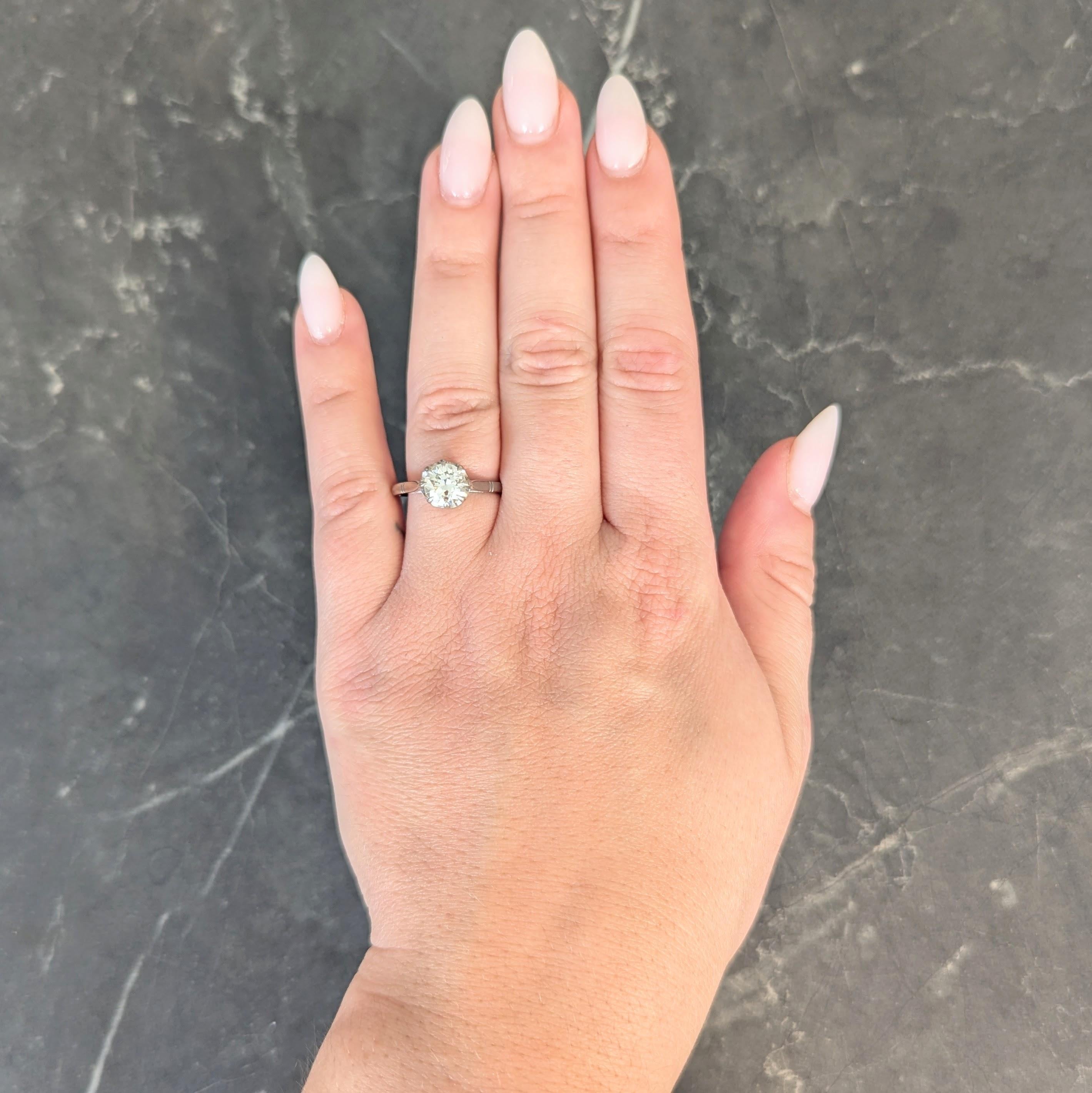 Centering a transitional cut diamond weighing approximately 1.16 carat - K color with SI1 clarity
Talon set in a belcher style head then flanked by cathedral shoulders
Tapered with grooved details
Stamped for 18 karat gold
With maker's mark
Circa: