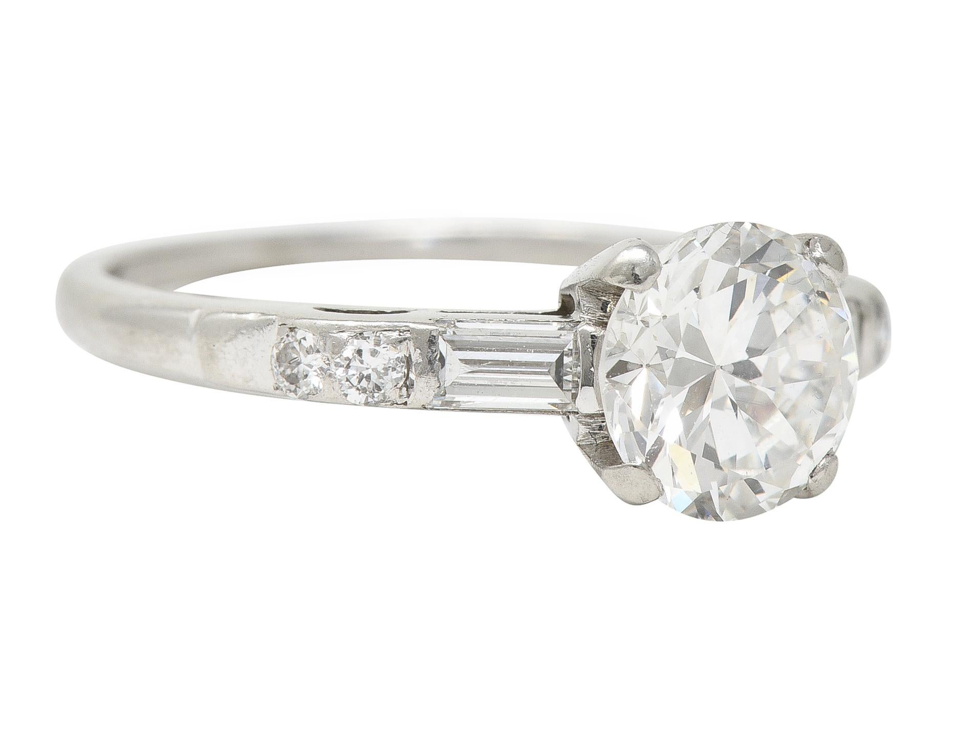 Centering a transitional cut diamond weighing approximately 0.97 carat total - H color with SI1 clarity
Prong set in basket and flanked by additional transitional and baguette cut diamonds
Weighing approximately 0.19 carat total - eye clean and