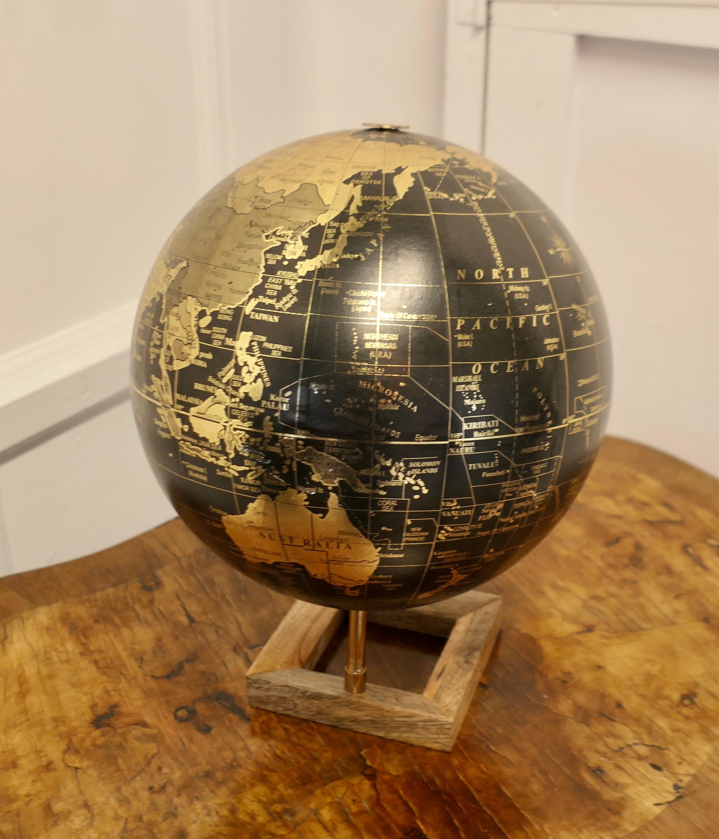 Mid-20th Century Mid Century 12” Terrestrial Black and Gold Globe For Sale