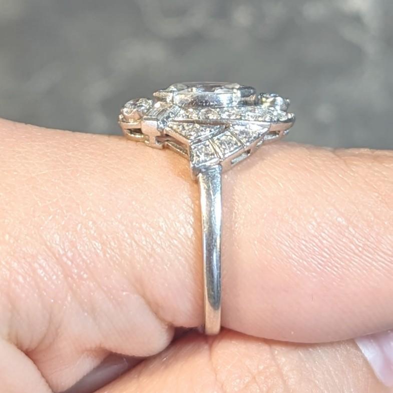 Mid-Century 1.26 CTW Diamond Platinum Swirling Marquise Vintage Dinner Ring For Sale 8
