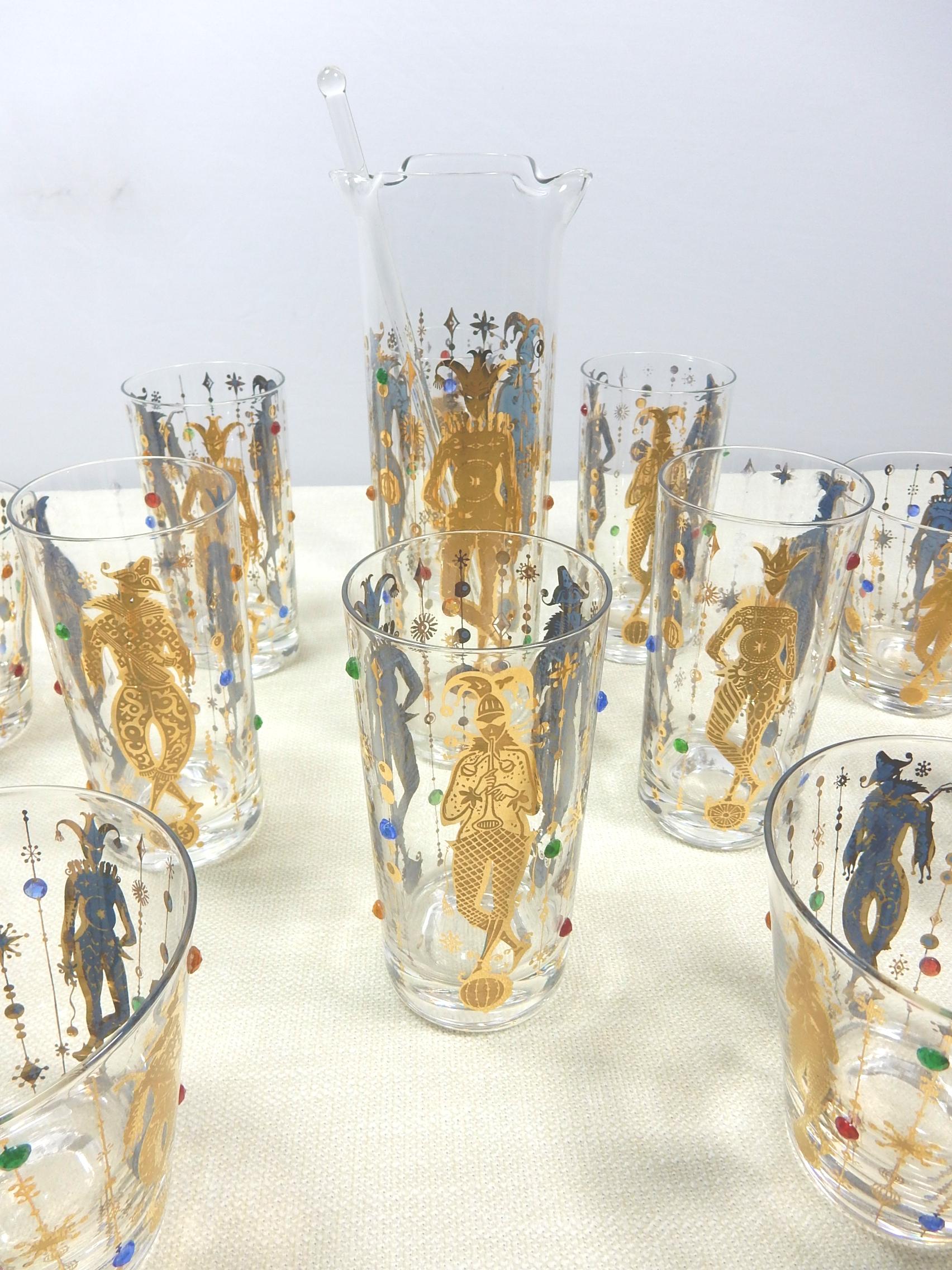 Rare 1960's bar glasses set by Culver LTD.
Harlequin design in 22-karat gold with applied colored jewels.
2 sets of 6 glasses and martini pitcher,
6 highballs and 6 rocks with tall martini mix pitcher and glass stir stick.
All pieces are in barely