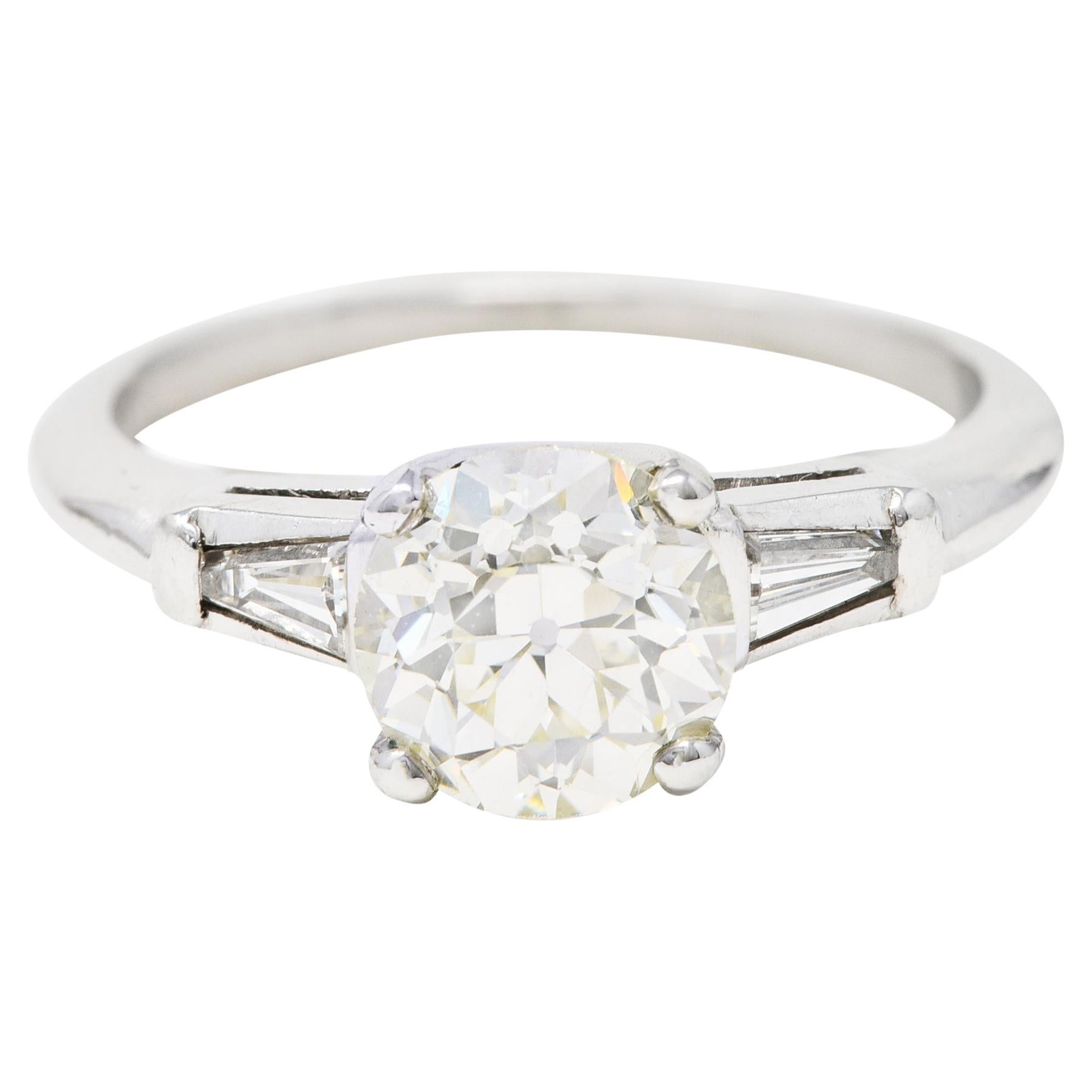 Mid-Century 1.34 Carats Diamond Platinum Vintage Three Stone Engagement Ring