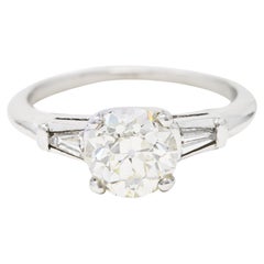 Mid-Century 1.34 Carats Diamond Platinum Vintage Three Stone Engagement Ring