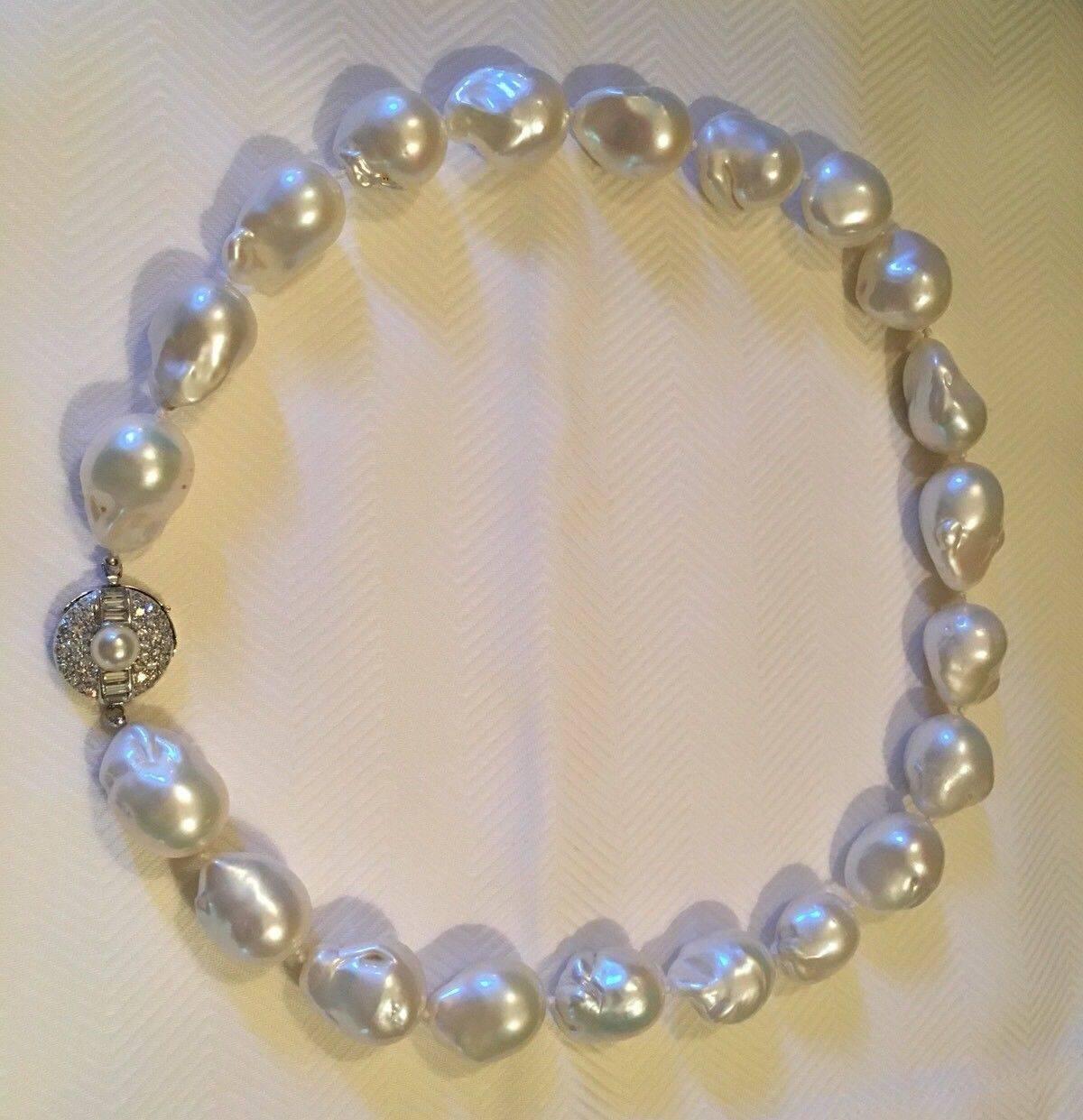 This gorgeous fine high quality cultured baroque pearl necklace measures 22