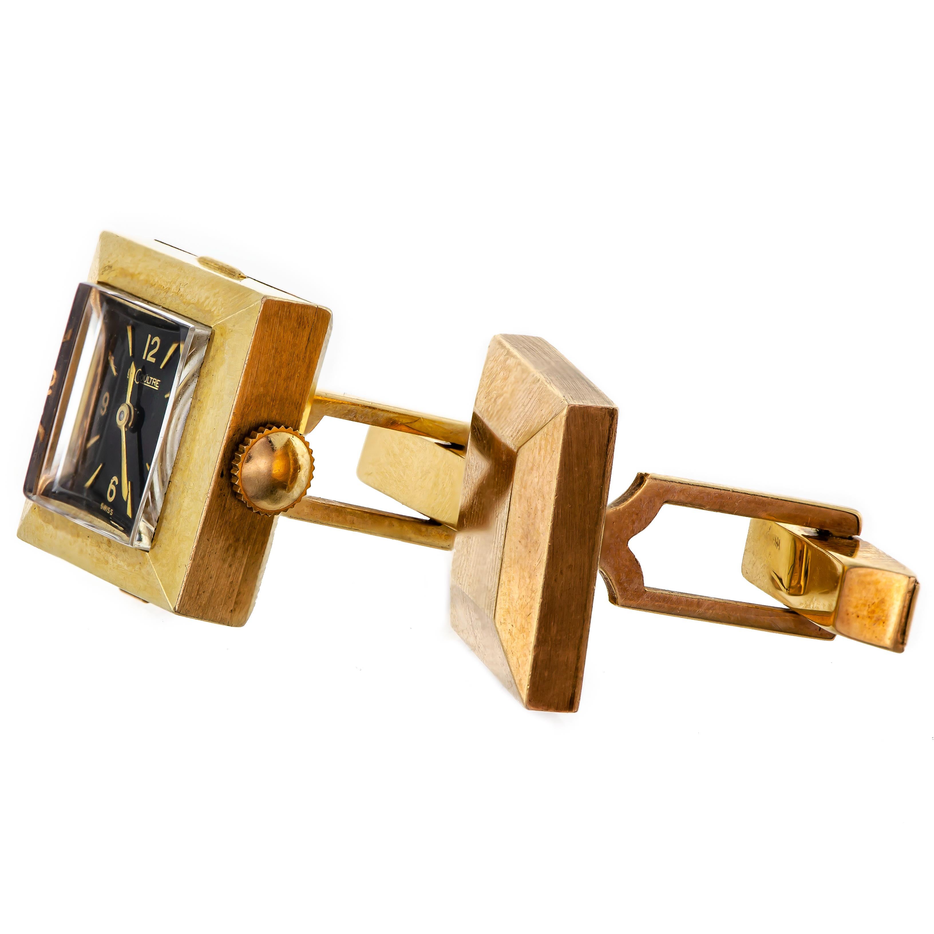 These are a pair of wonderful mid-century cufflinks made from 14K yellow gold, featuring a triple signed dial, case and movement LeCoultre watch. They were designed as a solid 14K yellow gold faceted square, with one cufflink set with a black dial