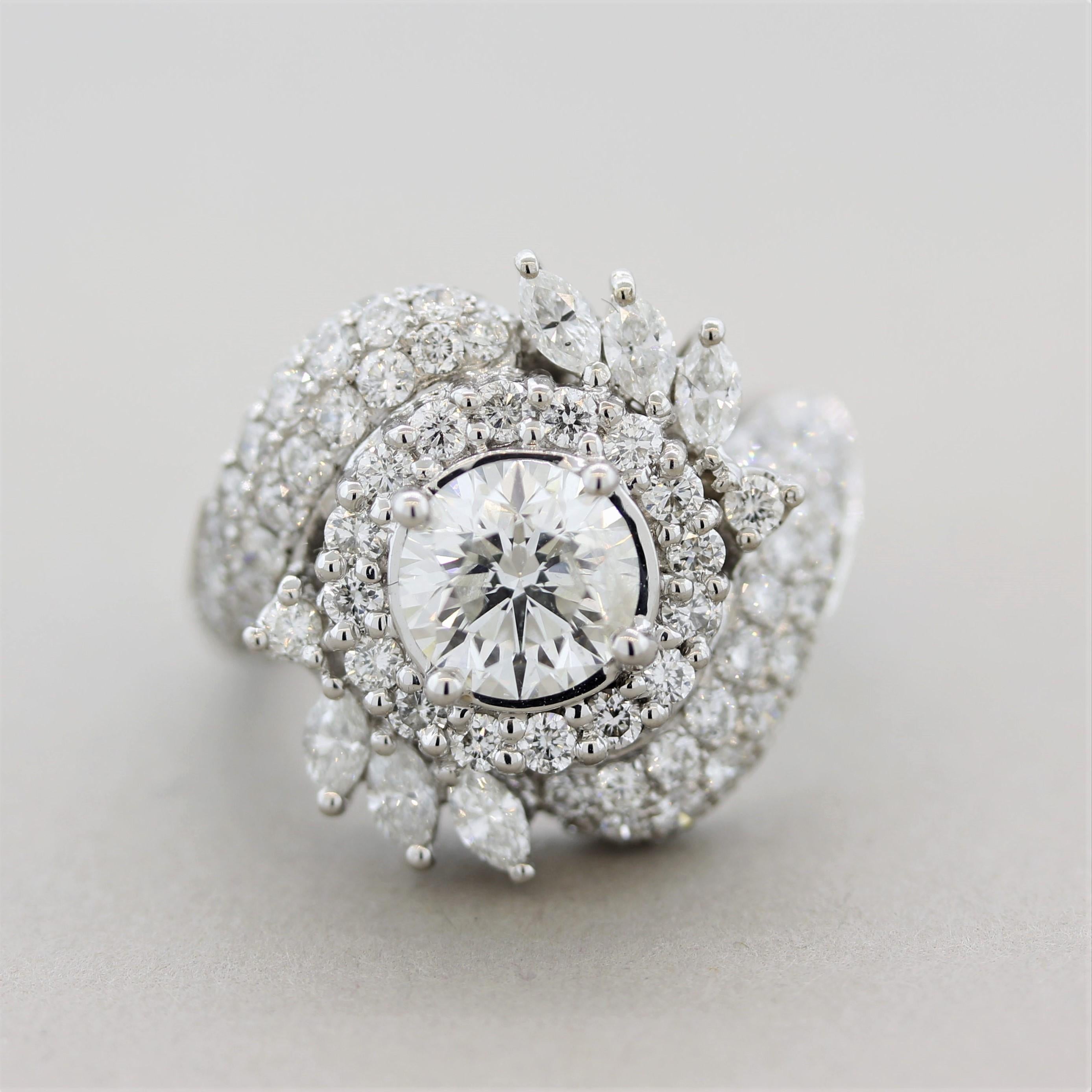 Une belle bague de fiançailles en diamant, datant des années 1960-1970, avec un diamant rond de taille brillant de 1,42 carat. Elle est vivante avec une brillance et un éclat excellents, avec un degré de clarté SI et presque incolore. Il est