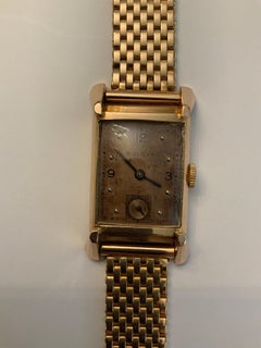 Mid Century 14K Gold Tank Bulova Watch