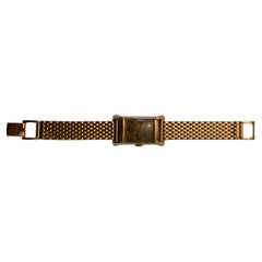 Orologio Bulova con serbatoio in oro 14K della metà del secolo scorso