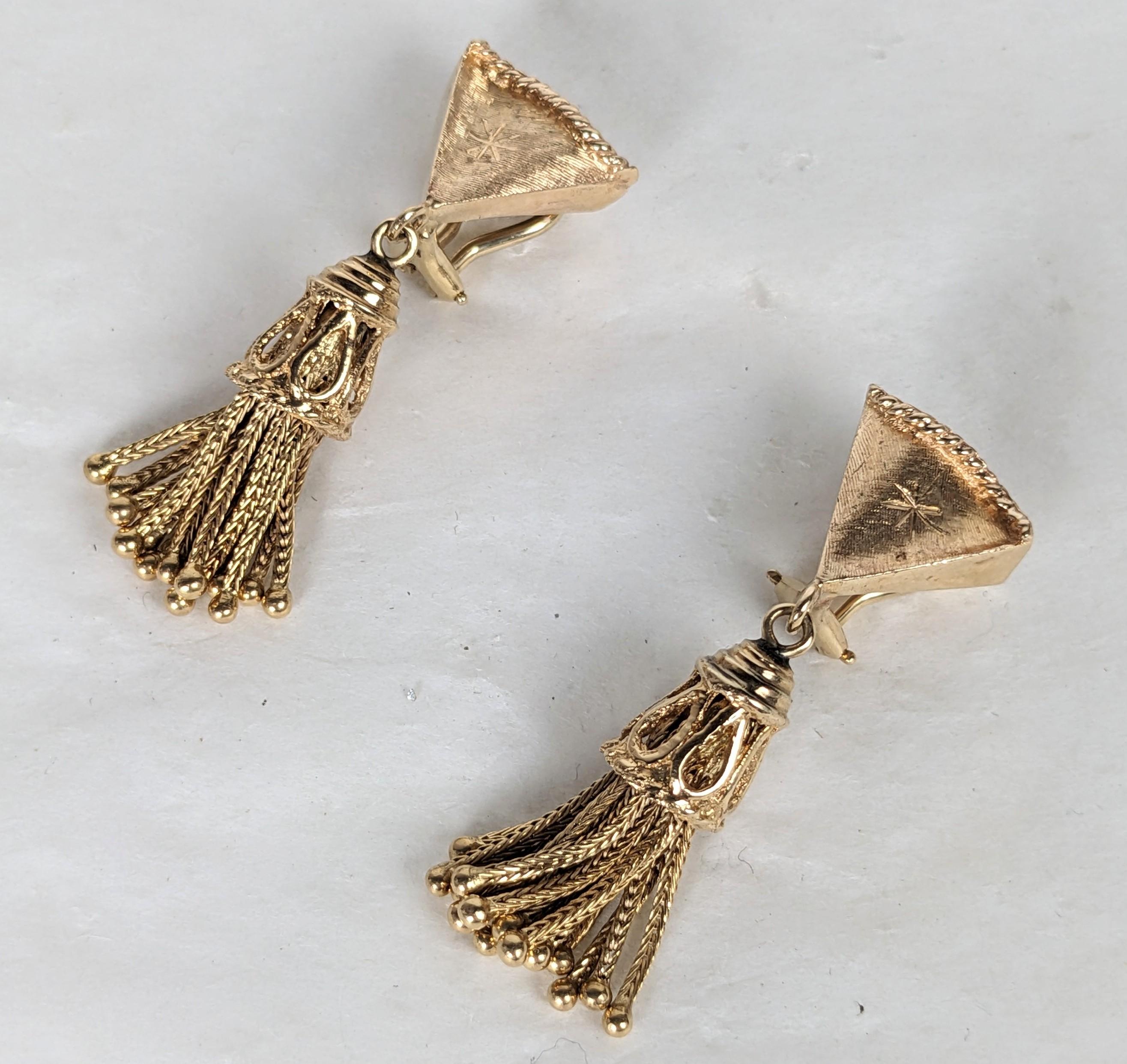 Elegant Mid Century 14K Gold Tassel Earrings circa 1960. Fan shaped engraved tops have clip back fittings with ornate caps and gold wheat chain tassels. 1.5