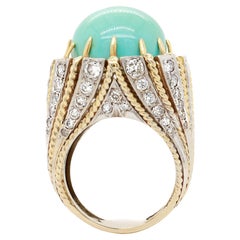 Mid-Century 14K Yellow
White Gold, Turquoise Cabochon,
Diamond Cocktail Ring Mid-Century 14K Yellow
White Gold, Turquoise Cabochon,
Diamond Cocktail Ring