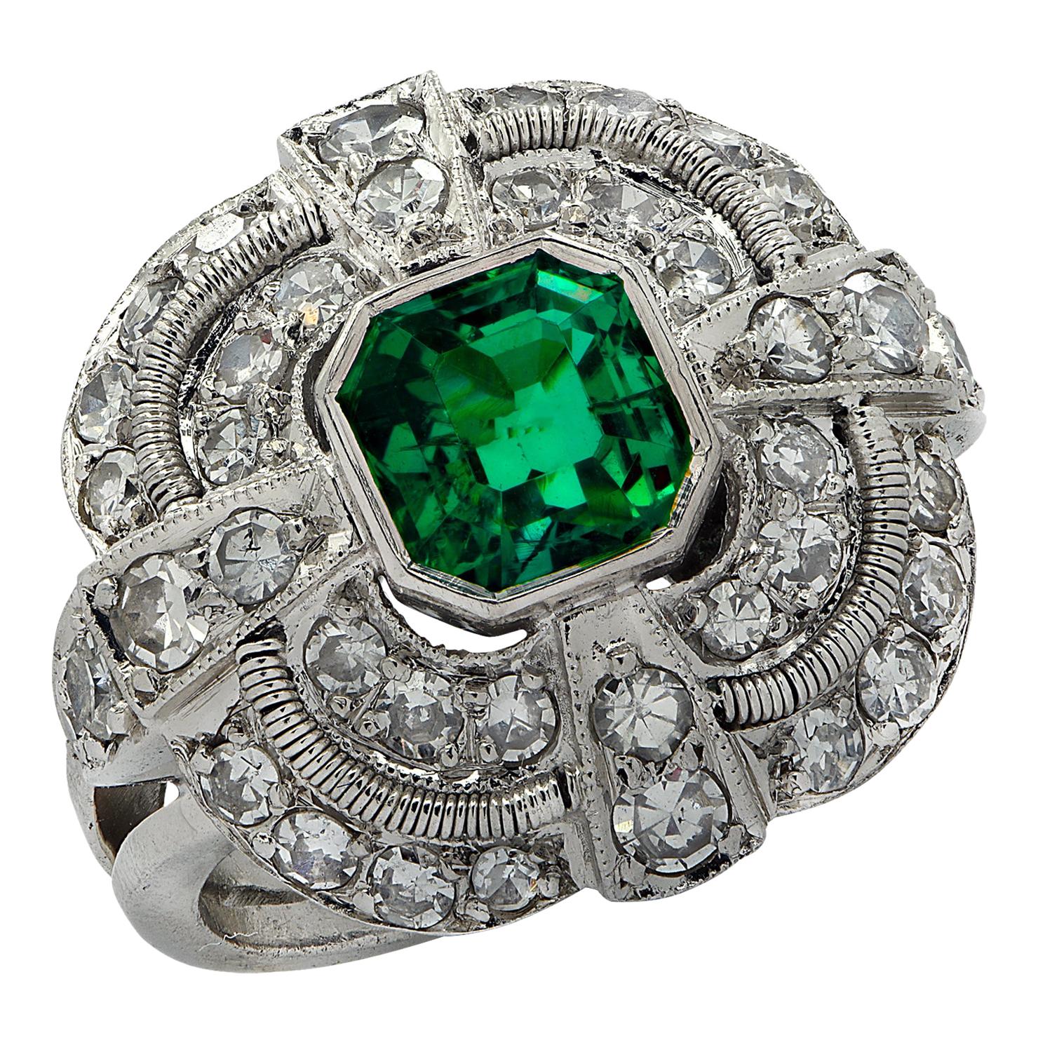 Mid Century 1.5 Carat Emerald and Diamond Ring