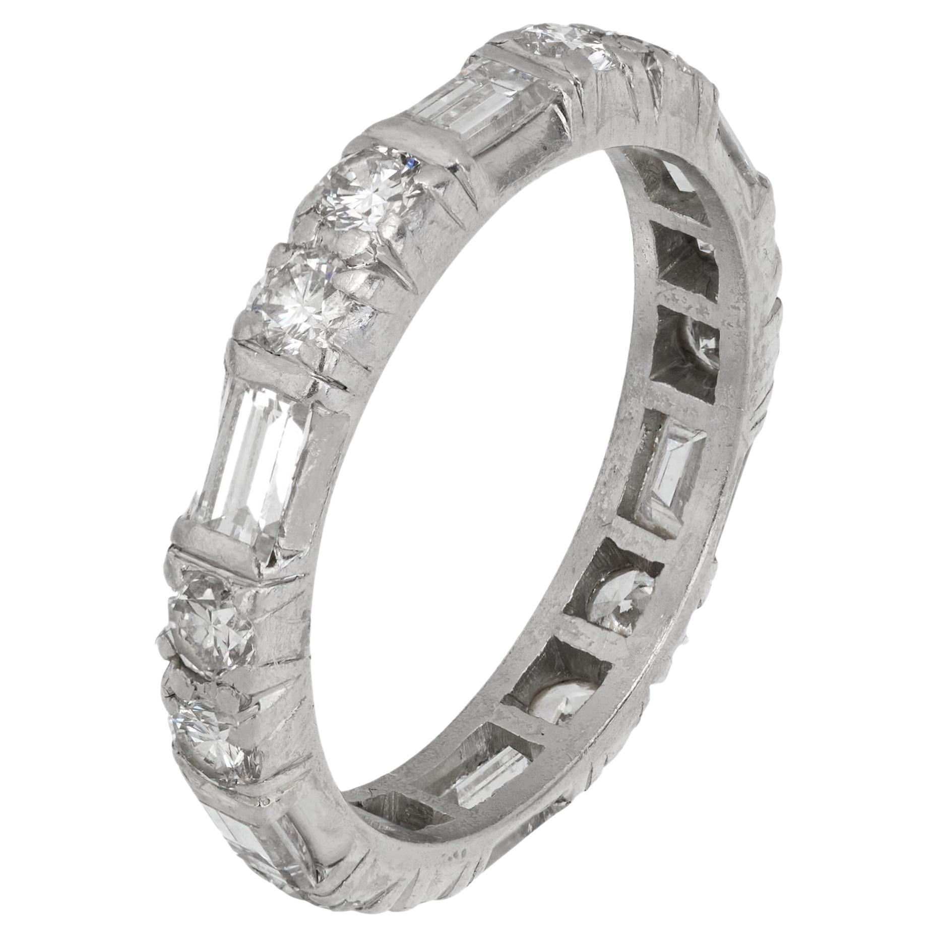 Mid Century 1.60 carat baguette and round brilliant cut diamond platinum ring