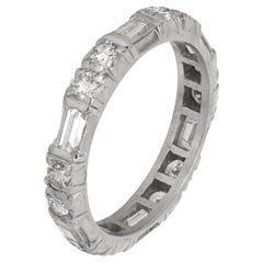 Mid Century 1.60 carat baguette and round brilliant cut diamond platinum ring