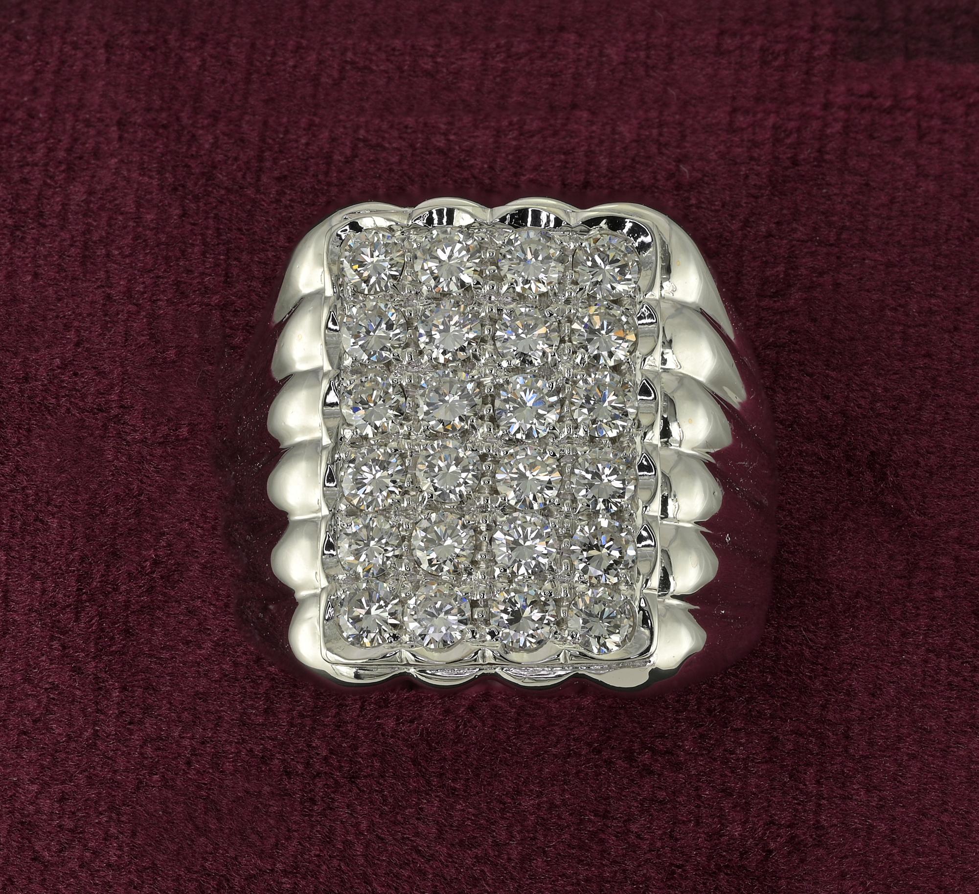 This superb mid century ring is 1950 ca
Substantially hand crafted of solid 18 Kt white gold, weighs 18.7 grams
Strong masculine character expressed in a study designed with fluted sides and rectangular Diamond panel on the front side
Diamonds are a