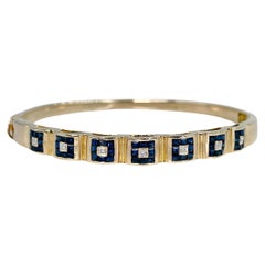 Vintage Mid Century 18 Karat Gold 1.40 Carat Sapphire Diamond Hinged Bangle Bracelet