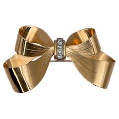 Mid Century 18 Karat Yellow Gold Zircon Bow Pin Brooch