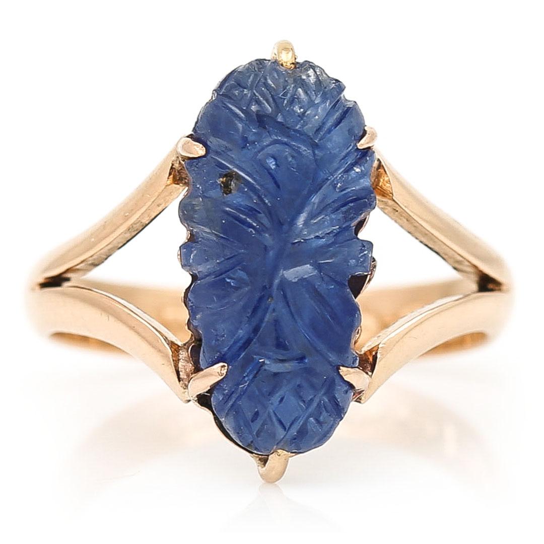 A stylish and totally unique mid century carved sapphire ring set in 18ct rose gold shank dating from circa 1958. The ring which was masterfully crafted and hand carved originates from the island of Gotland in Sweden from a small village - Hemse.