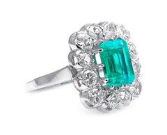 Midcentury, 18 Carat White Gold, Colombian Emerald and Diamond Cluster Ring