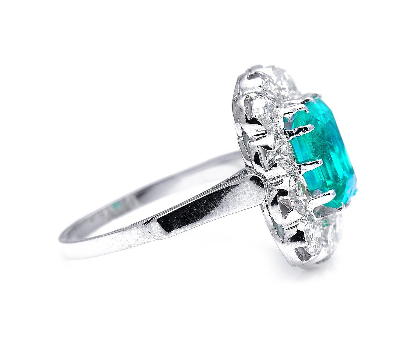 Emerald Cut Midcentury, 18 Carat White Gold, Colombian Emerald and Diamond Cluster Ring