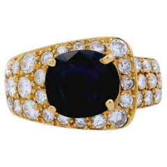 Mid-century 18k Gold Ring with Diamonds and Sapphire
