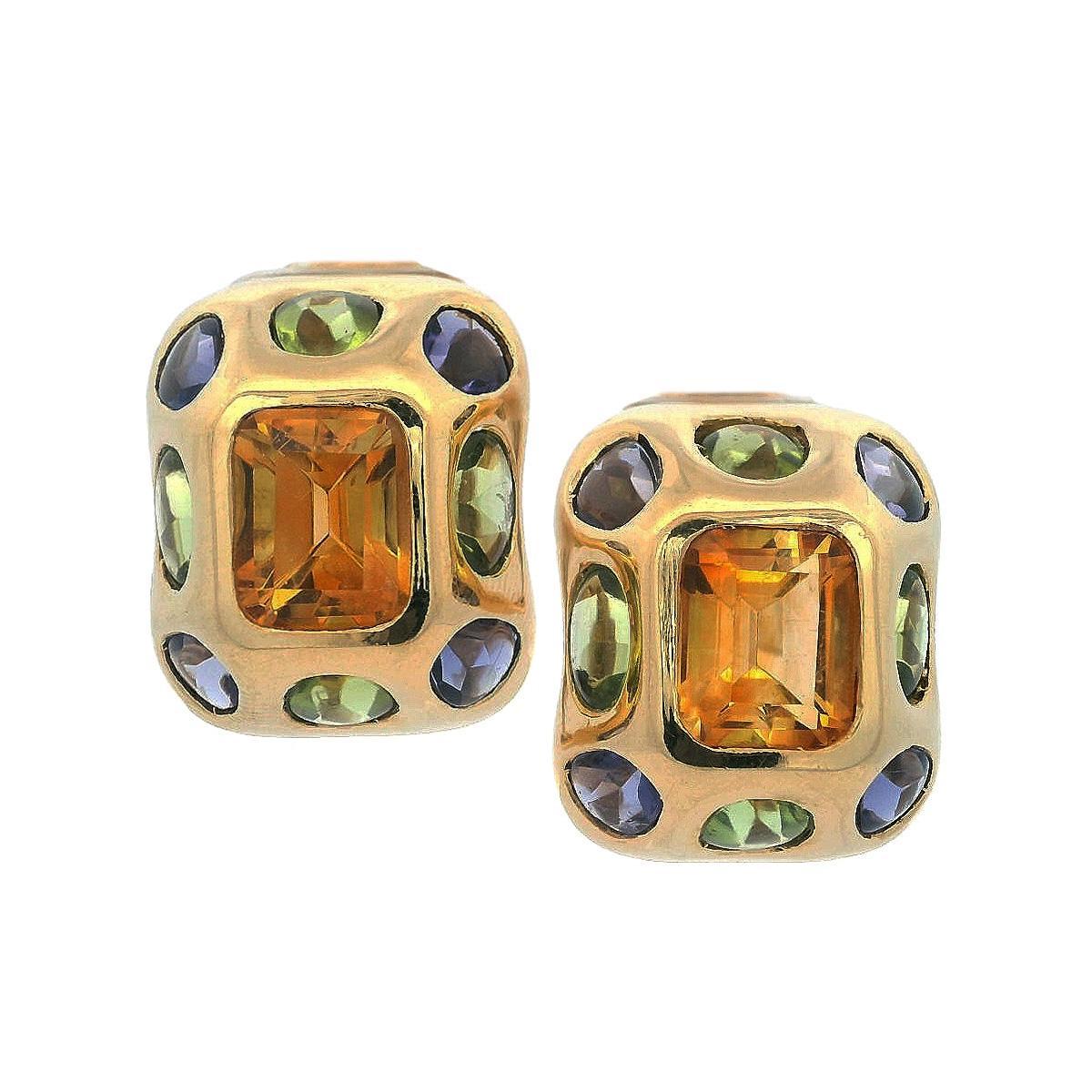 Entra nel mondo glamour degli anni '60 con questi orecchini a clip mozzafiato della metà del secolo scorso, realizzati in oro giallo 18 carati. Con due magnifici citrini taglio smeraldo del peso di circa 7,60 carati, incarnano magnificamente