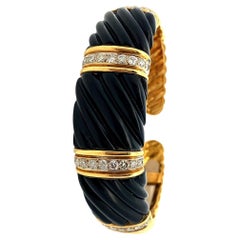 Mid-century 18kt Gold Cuff Bracelet with Diamonds and Onyx