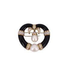Mid-century 18kt yellow Gold Pendant / Brooch with Diamonds, Pearls
Onyx