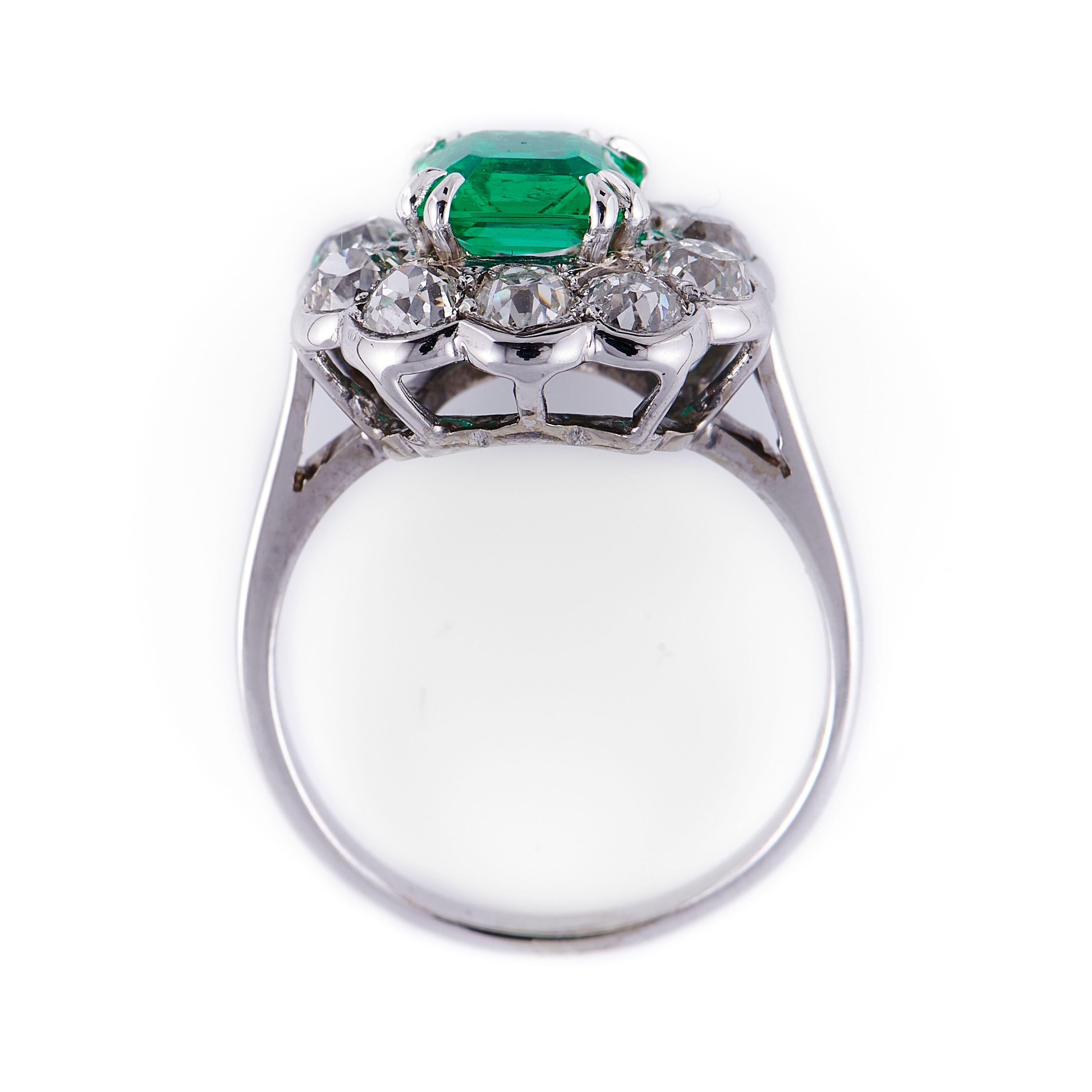 Women's Midcentury, 1940s 18 Carat White Gold Colombian Emerald and Diamond Cluster Ring