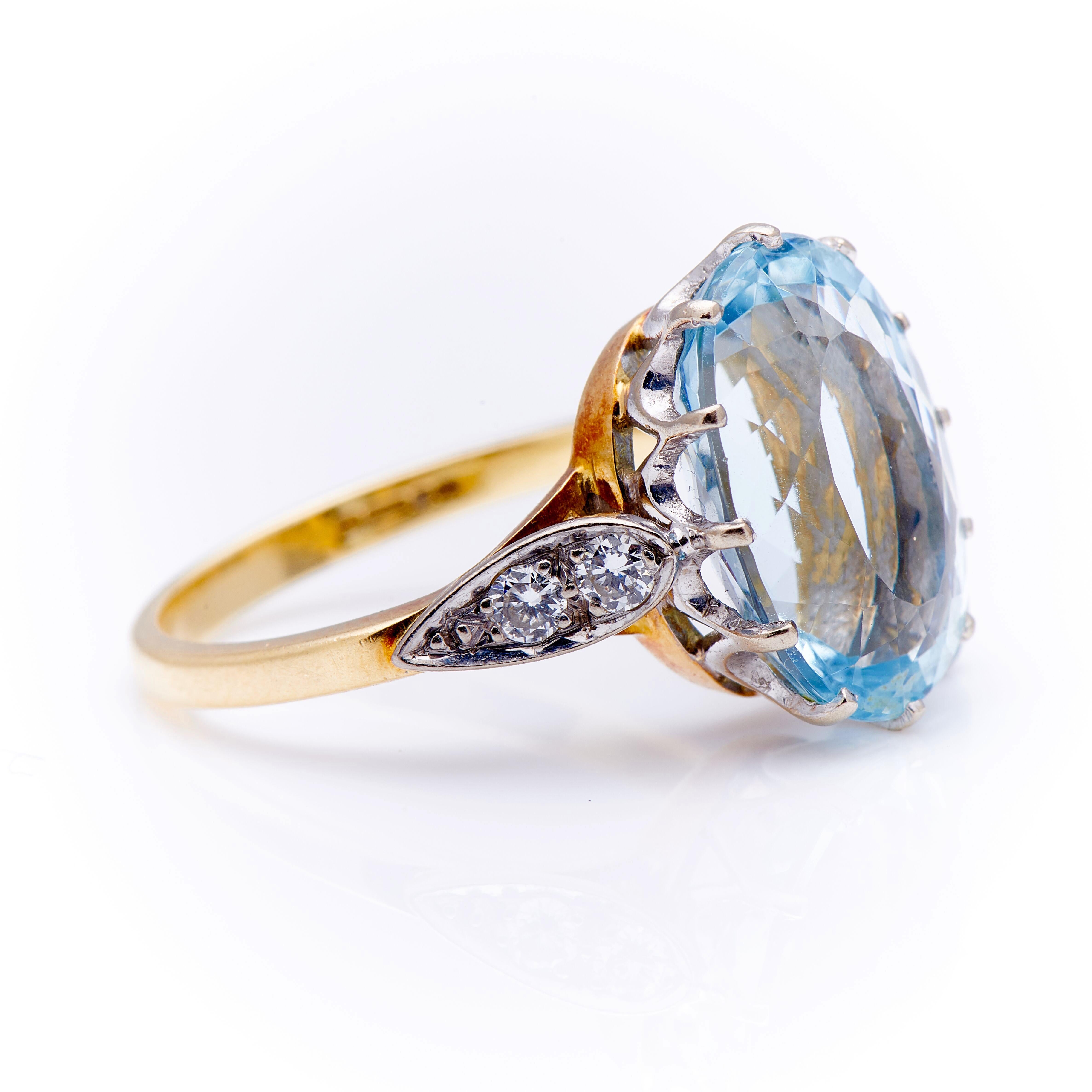 Aquamarine and diamond ring, circa 1950. Claw-set with an oval aquamarine weighing approximately 6 carats, the shoulders of teardrop design set with brilliant-cut diamonds. Aquamarine is a pale blue variety of beryl, the family of stones that
