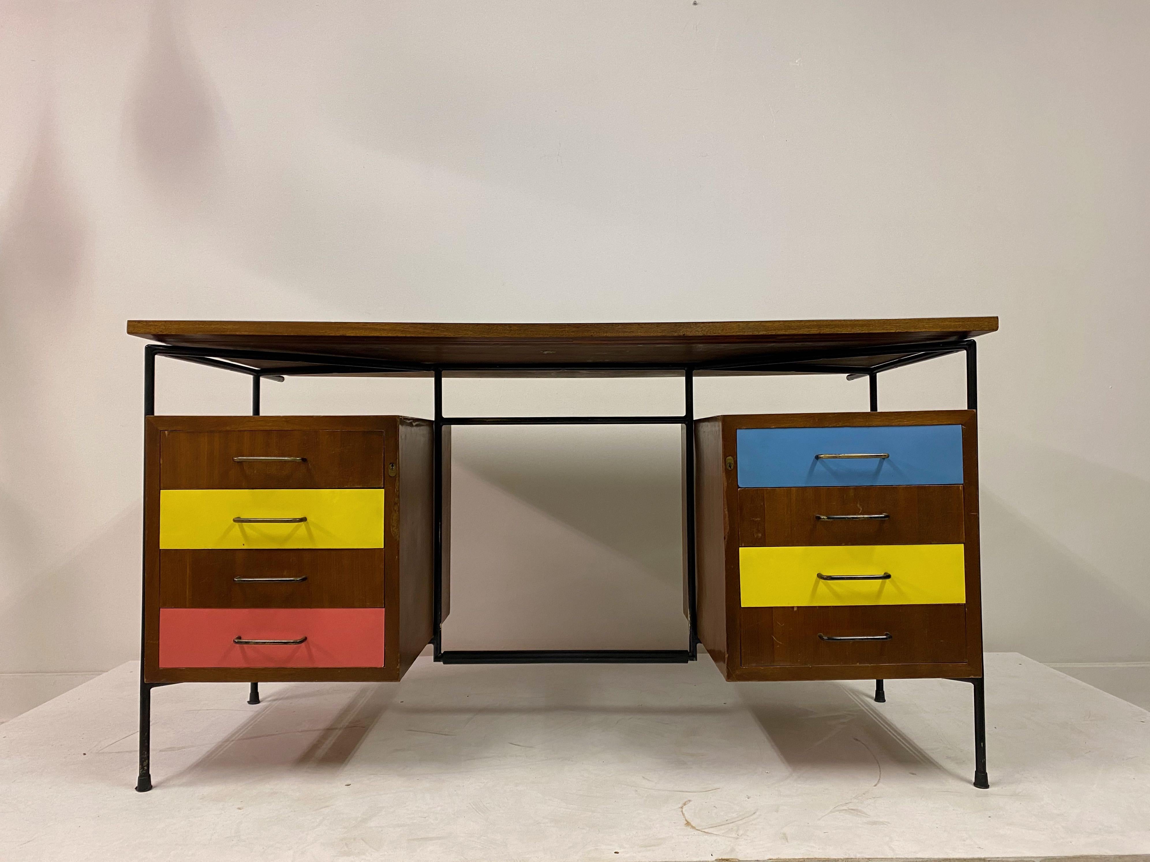 Desk by Giuseppe Postiglione

Colored laminate drawers and top

Enameled iron rod frame

Black painted brass handles,

Italian, 1950s.