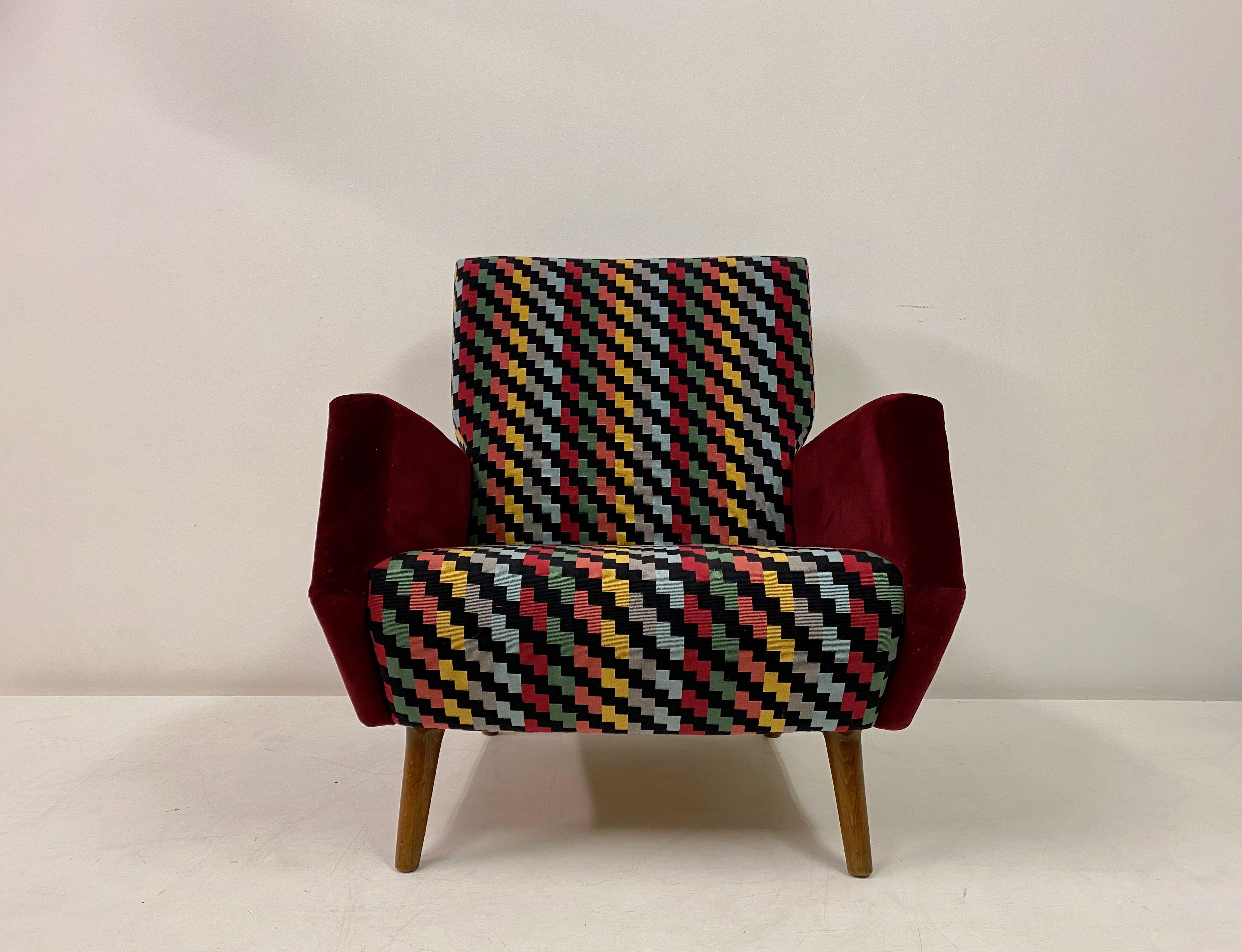 Armchair by Gio Ponti

Model 803

New upholstery

Stained beech legs

Made by Cassina

Retailed by Illums Bolihus (label attached)

Upholstered in Pierre Frey fabric with Vescom velvet arms

Measure: Seat height 38cm

Italy,