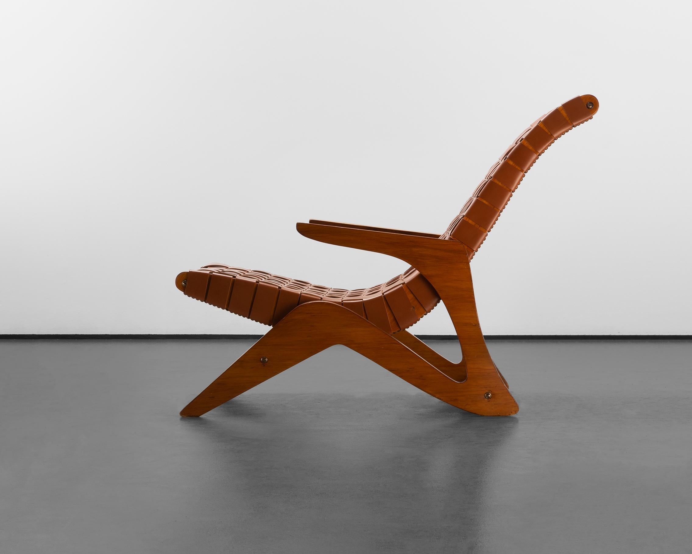 The structure of the lounge chair is made of marine plywood, which allows it to be made from a single cut, with an organic shape. the frame is cut into fluid, angular forms that convey both strength and lightness, with a profile that invites