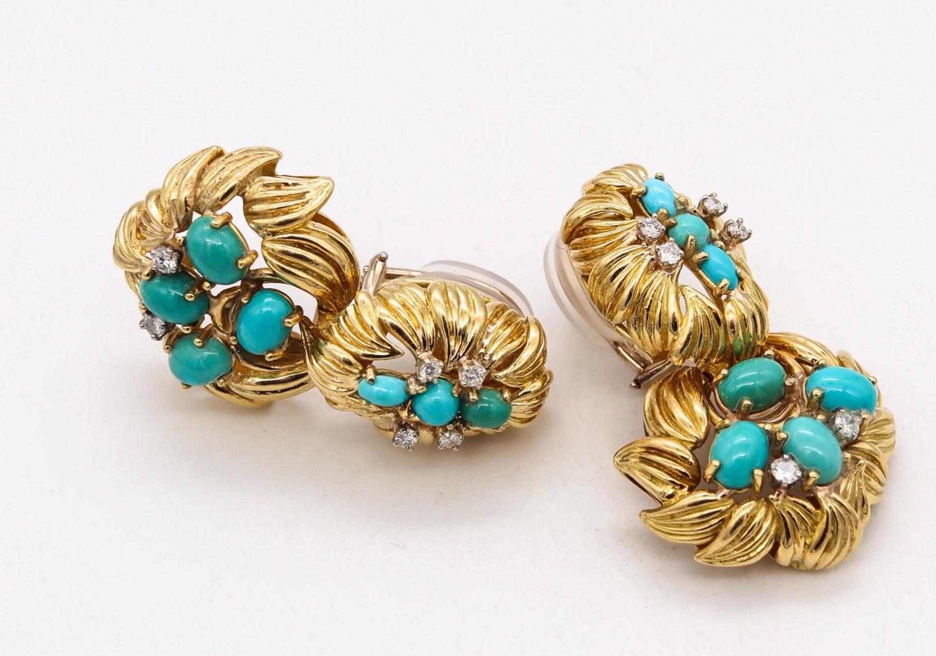Mid Century Cluster gem-set drops earrings.

Beautiful pair created during the American late mid-century period, circa 1960's. These gem-set drop earrings has been crafted in two movable parts with organic elements in solid yellow gold of 18 karats,
