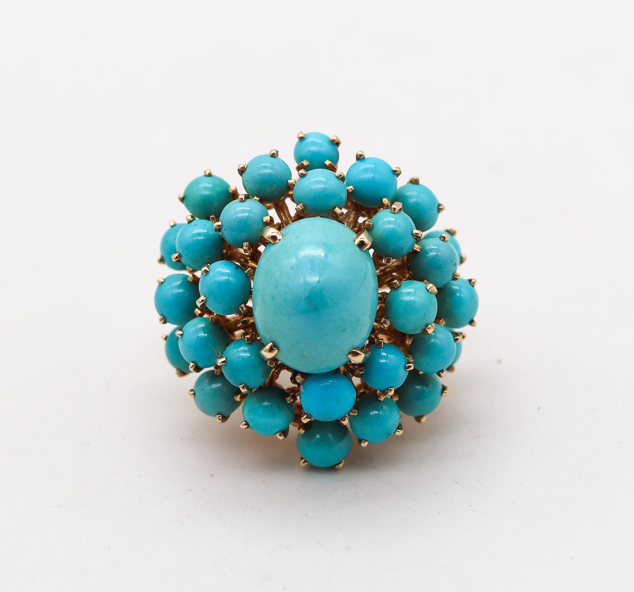 Bombe cluster cocktail ring with natural turquoises.

A great statement cocktail ring, created during the late mid-century period, back in the 1960. This ring was designed as a domed cluster, carefully crafted in solid yellow gold of 14 karats with