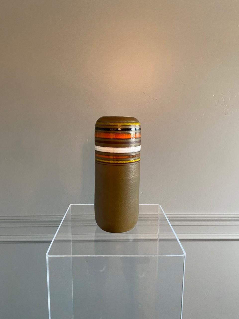 Created by Bitossi’s creative director, Aldo Londi and distributed worldwide by Rosenthal Netter. Midcentury Italian art pottery vase by Rosenthal Netter for Bitossi. Undeniably midcentury classic piece. Cylindrical vase with a classic palette
